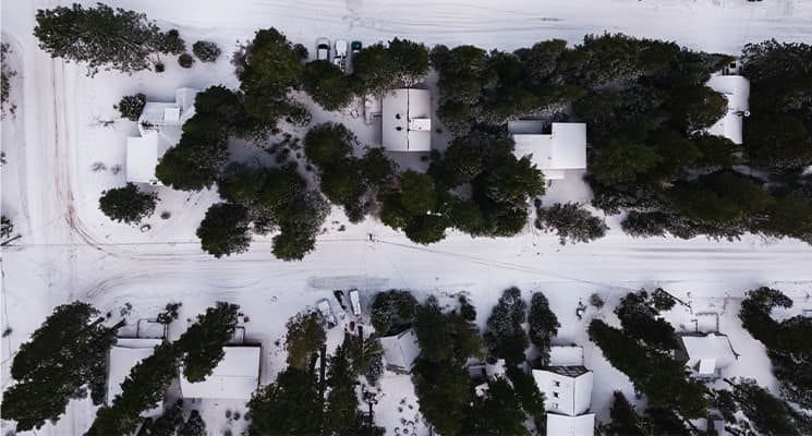 top of houses in the winter