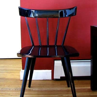 black chair and red wall