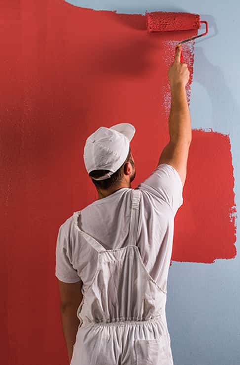 interior painter painting red on wall